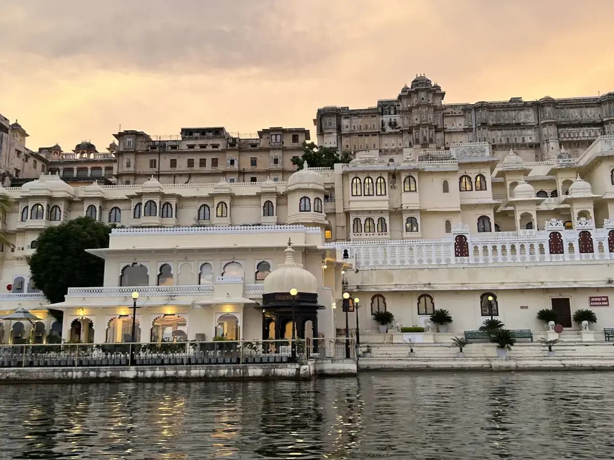 City Palace beside Lake Pichola in Udaipur, Rajasthan, India, at golden hour
